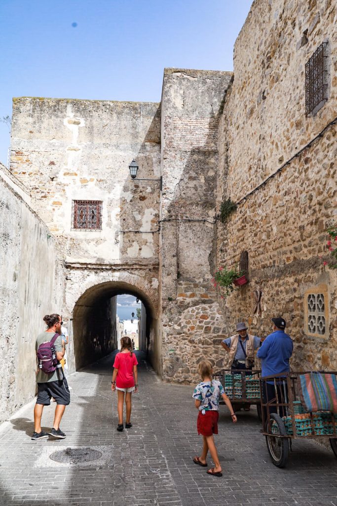 A family walk through the Kasbah in Tangier while on vacation