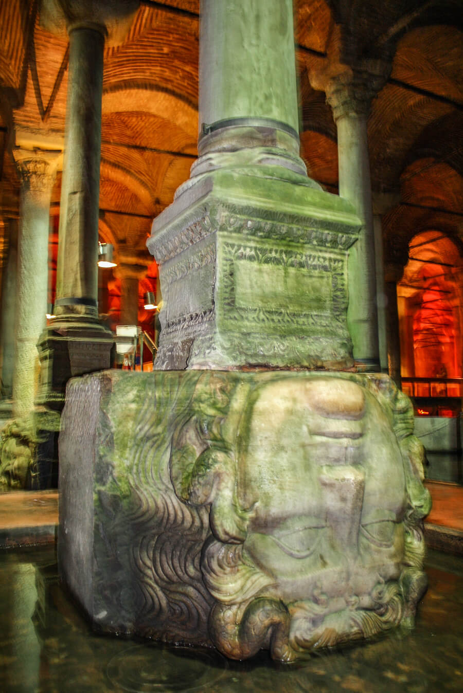 The Medusa head positioned upside down in the Basilica Cistern.  This is one of the best places to visit over 4 days in Istanbul.