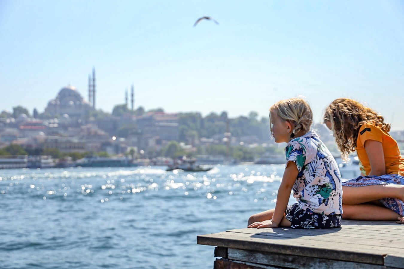 Two girls look out over the Golden Horn in Istanbul