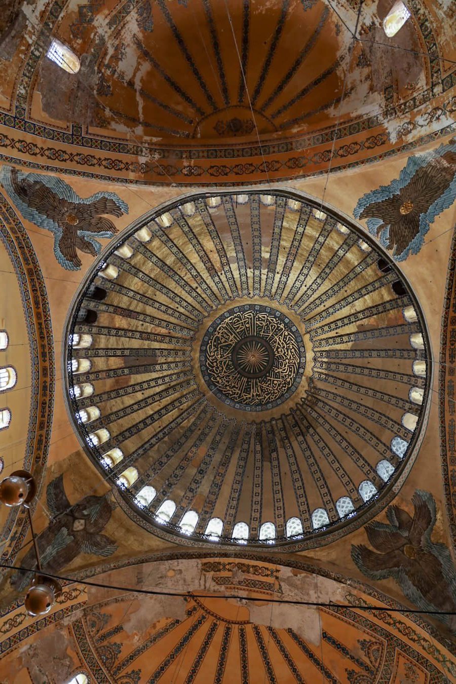 The centre dome inside the Hagia Sofia with winged angels in the four corners. 