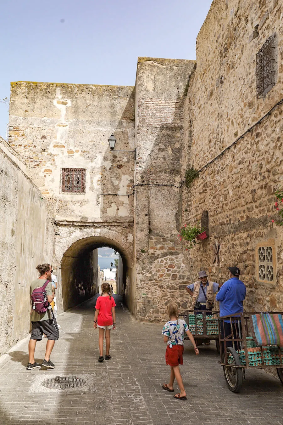 A family walk through the Kasbah in Tangier on a day trip from Tarifa, Spain