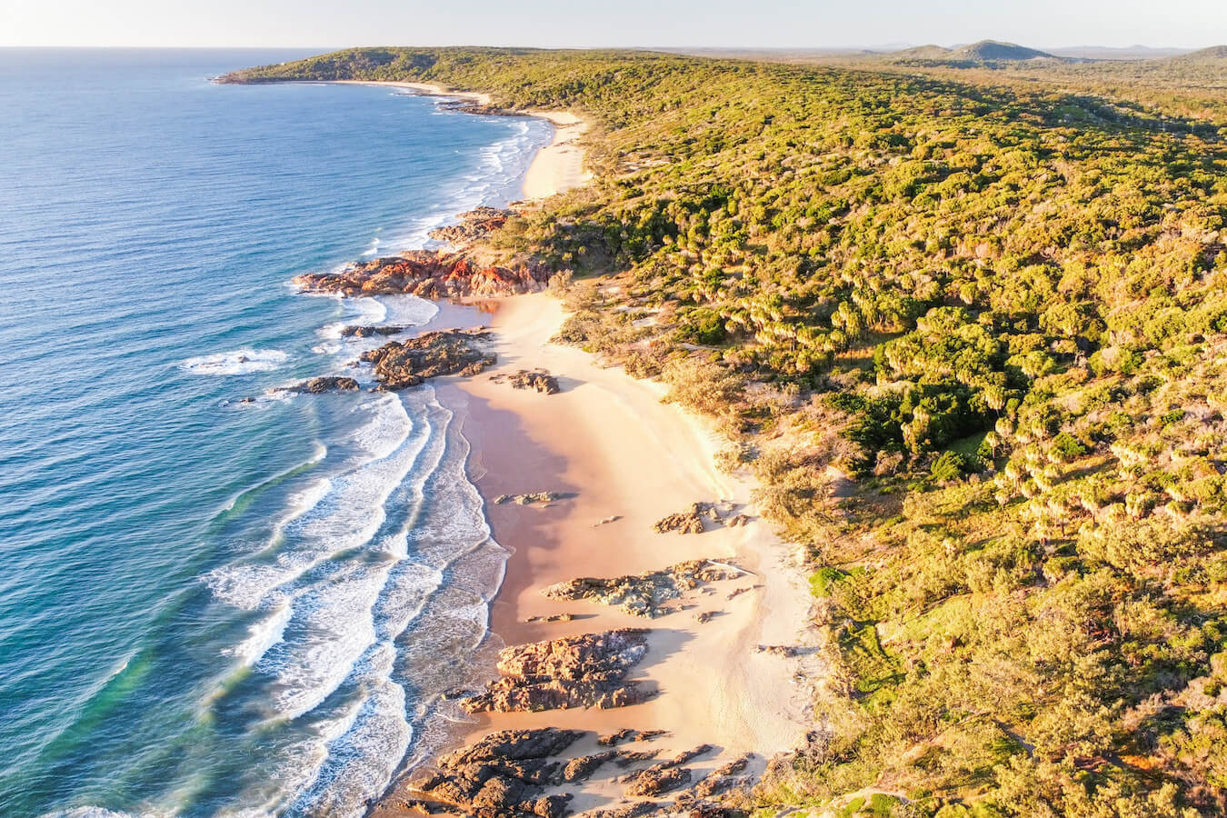 Secret beach and Chinaman's beach photo taken by drone - these are the best beaches in Agnes Water and 1770 and one of the best walking activities to do if visiting