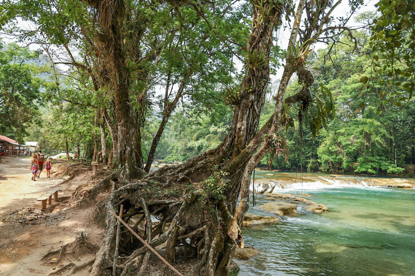 A father and his two daughters, walking along the track at Agua Azul in Palenque. 