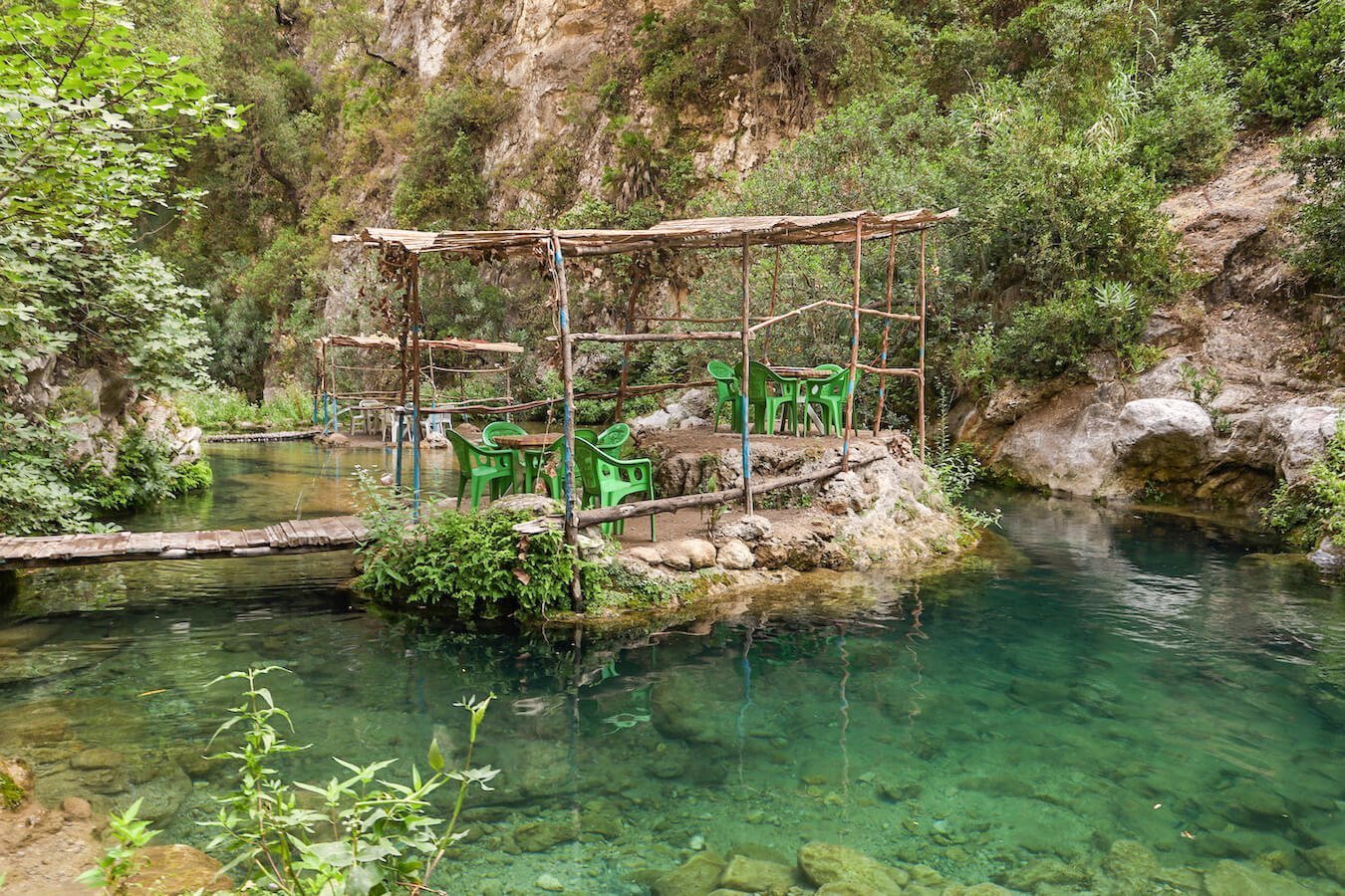 The unique river tables in Akchour on the God's Bridge trail - a day trip from Chefchaouen.