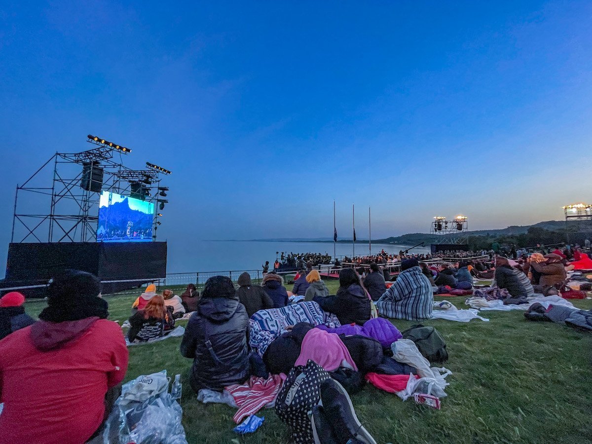 Travellers attend the Anzac Dawn Service at Gallipoli as part of a tour