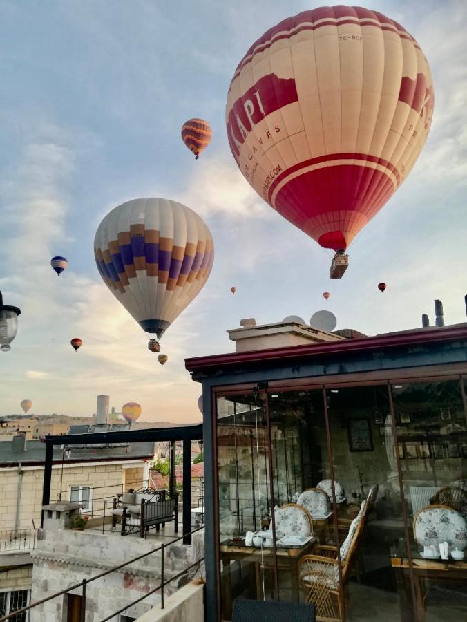 Views of hot air balloons at the Aren Cave Hotel and Art Gallery in Cappadocia