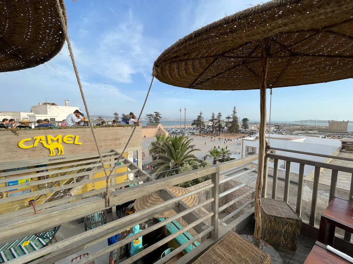 The view over the fishing port and port du Skala in Essaouira from Taros rooftop bar - one of the best places that serve alcohol in Essaouira