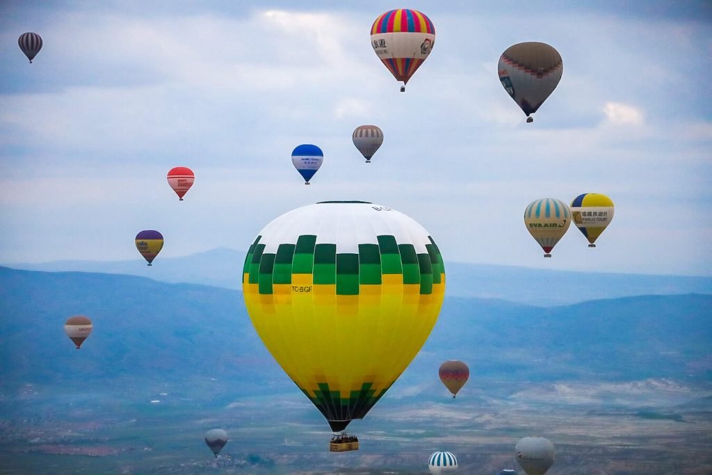 Hot air balloons fill the sky over Goreme