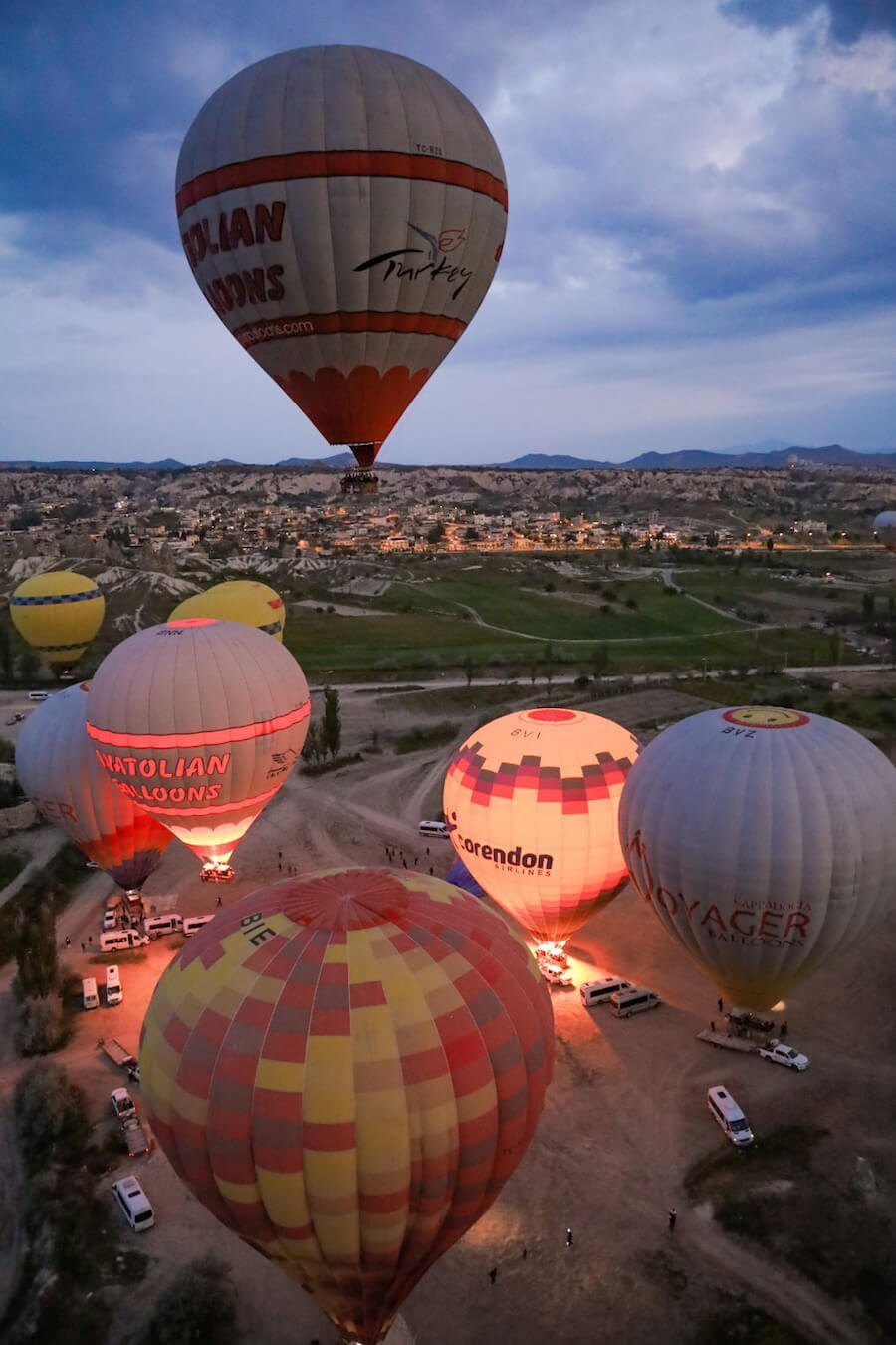 The Hot Air Balloons launch at sunrise in Cappadocia near Rose and Red Valley Goreme.