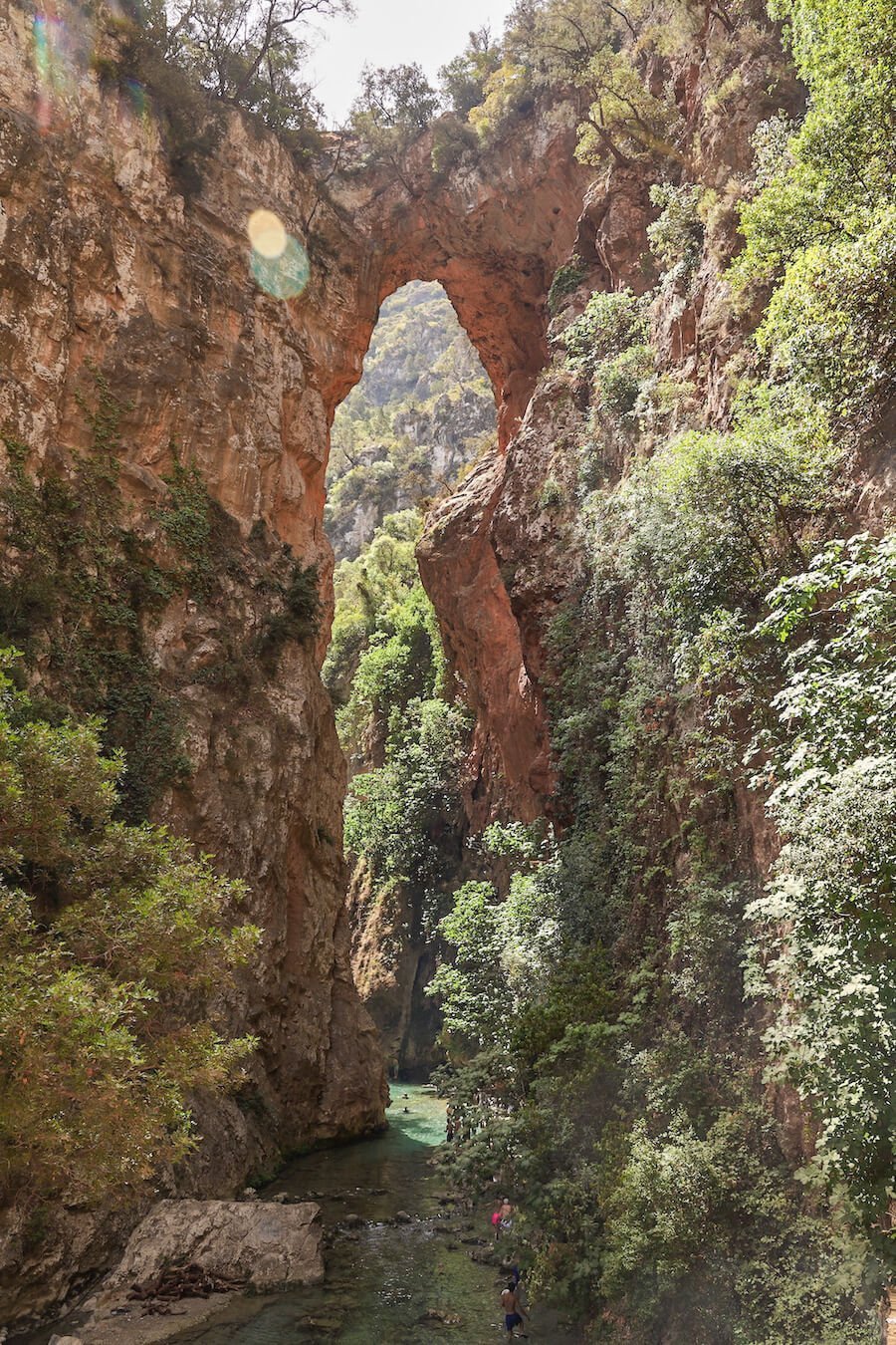 The breathtaking God's Bridge of Akchour near Chefchaouen, is one of the top things to do when visiting Morocco