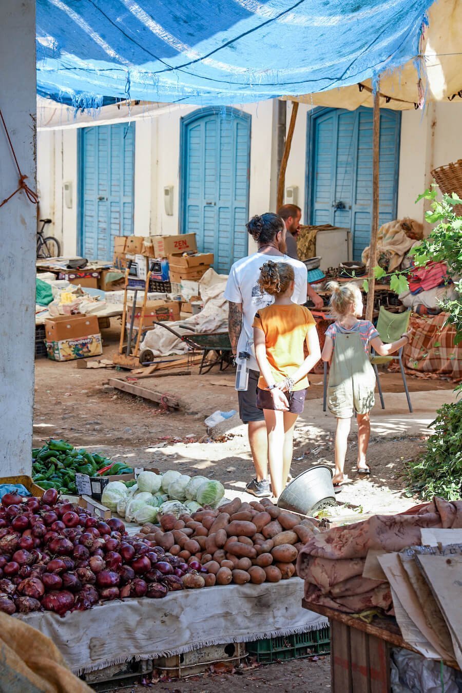A family walk through the Vegetable souk Morocco