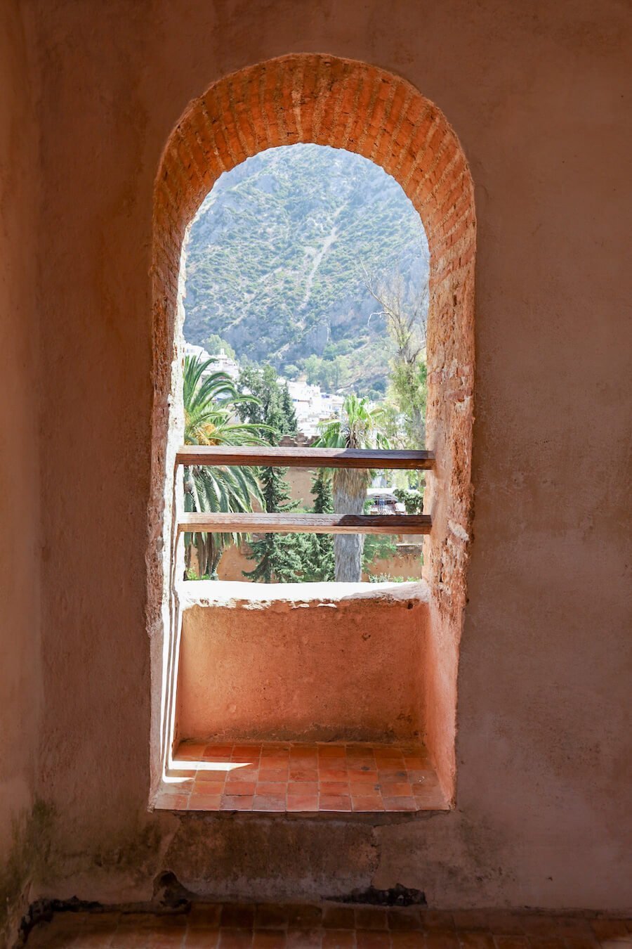 Looking through the fortress window of the Chefchaouen kasbah in Morocco