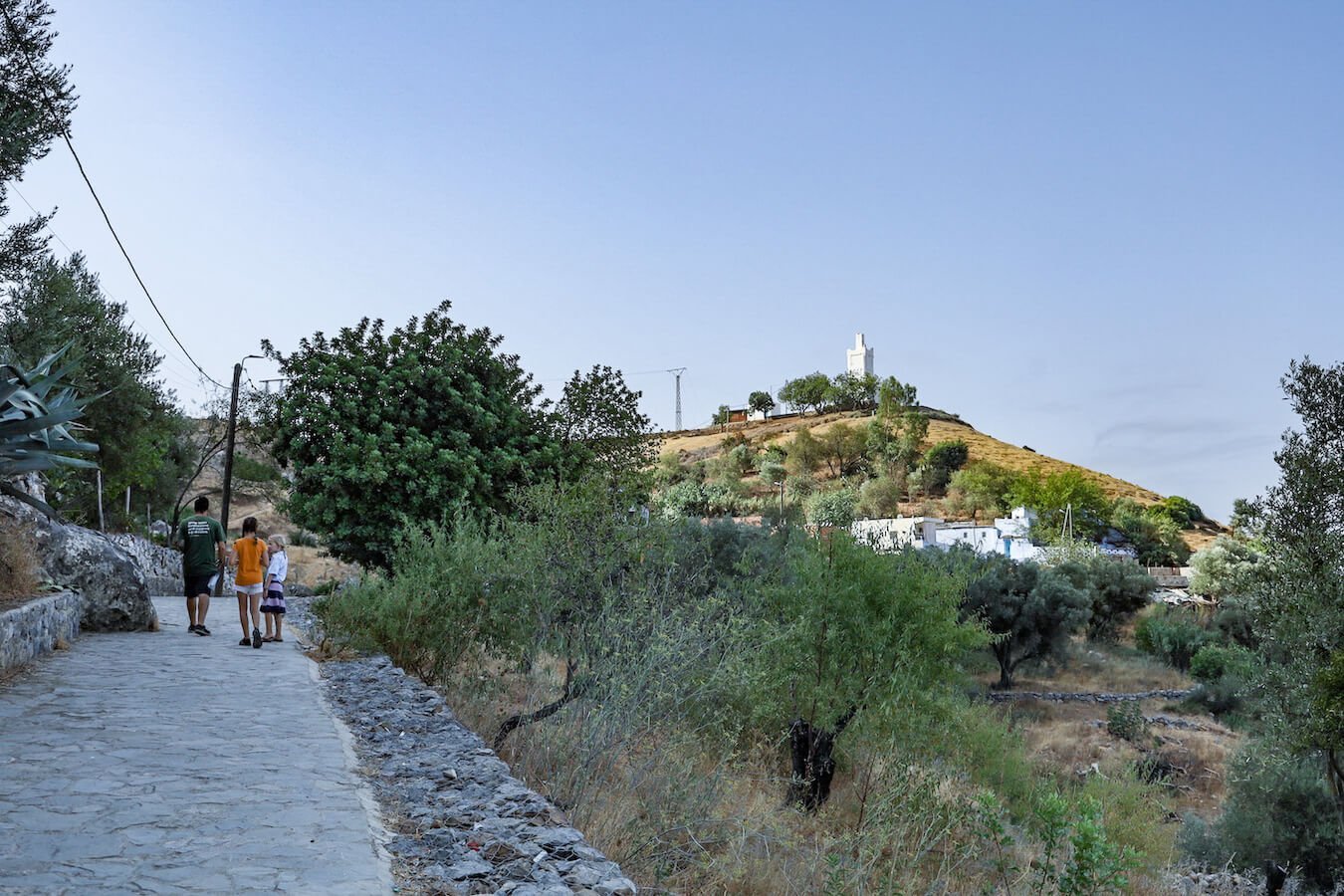 A family walk to the Spanish Mosque for sunrise - a beautiful destination on on Morocco Itinerary 