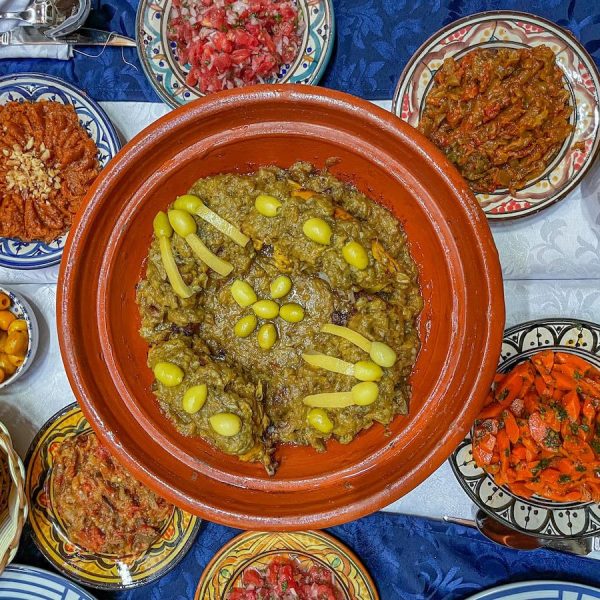 A lemon tagine and side salads made during a cooking class in Fes Morocco