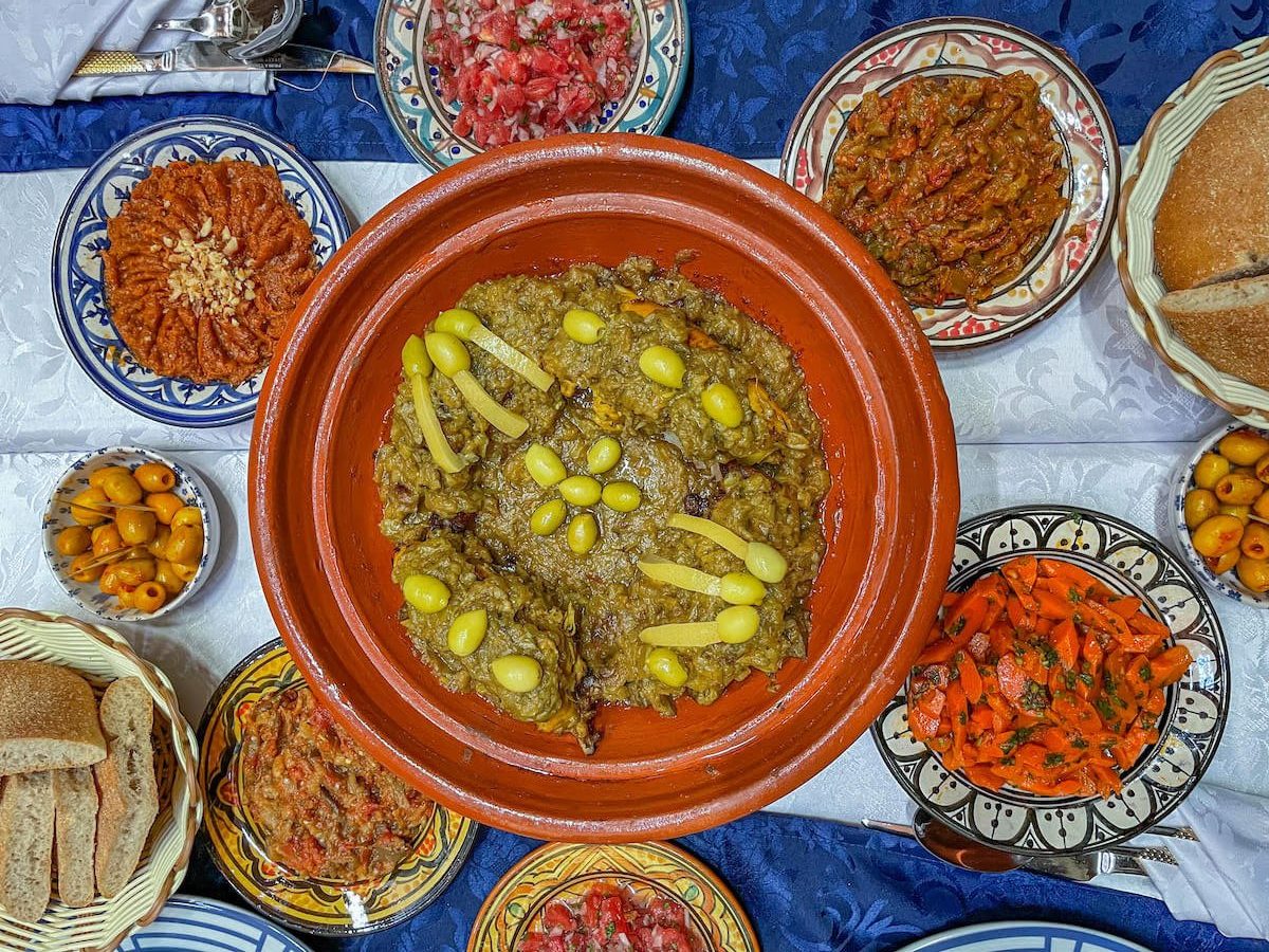 A lemon tagine and side salads made during a cooking class in Fes Morocco