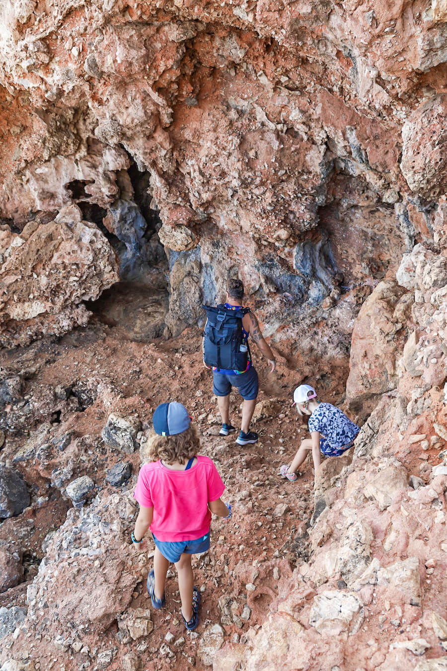 A family walk along the challenging path of the Cova Tallada trail.