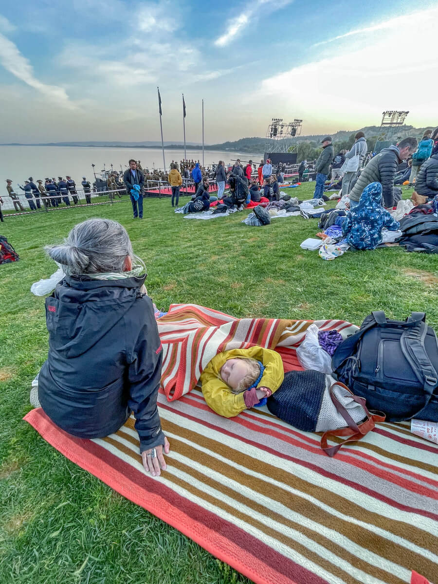 Child sleeps on a mat at the Dawn Service ceremony in Gallipoli Turkey.