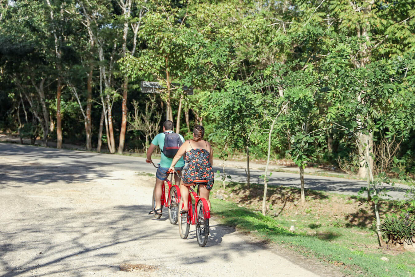 Tourists rent bikes from Valladolid to explore nearby cenotes.