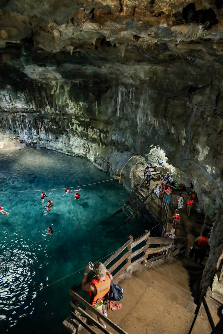 People swim in the Samula Cenote, at the Dzitnup complex of cenotes near Valladolid, Mexico.