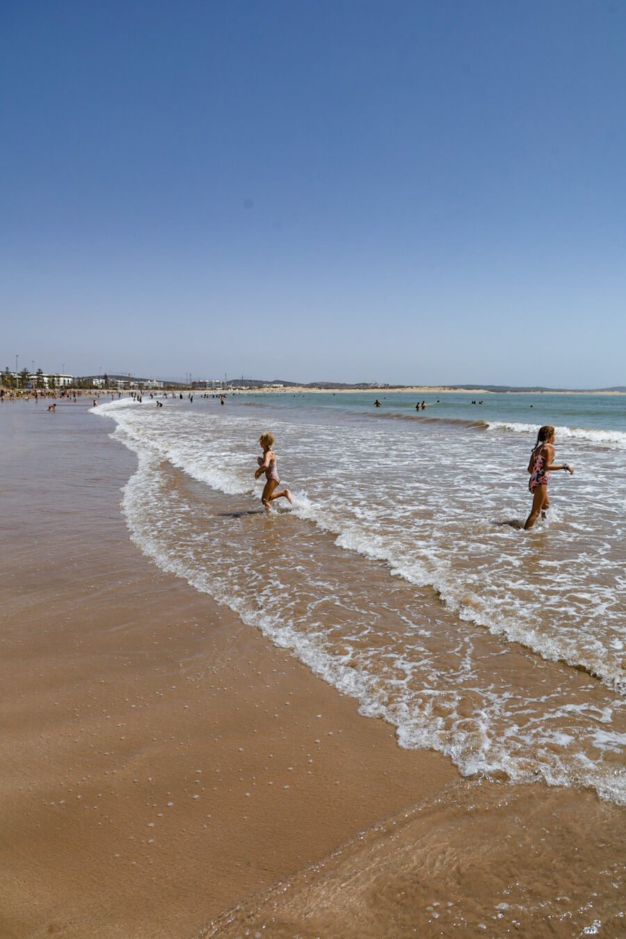 Kids play at one of the best beaches in Essaouira