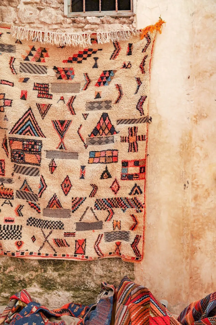 A carpet is displayed outside a carpet shop in Morocco