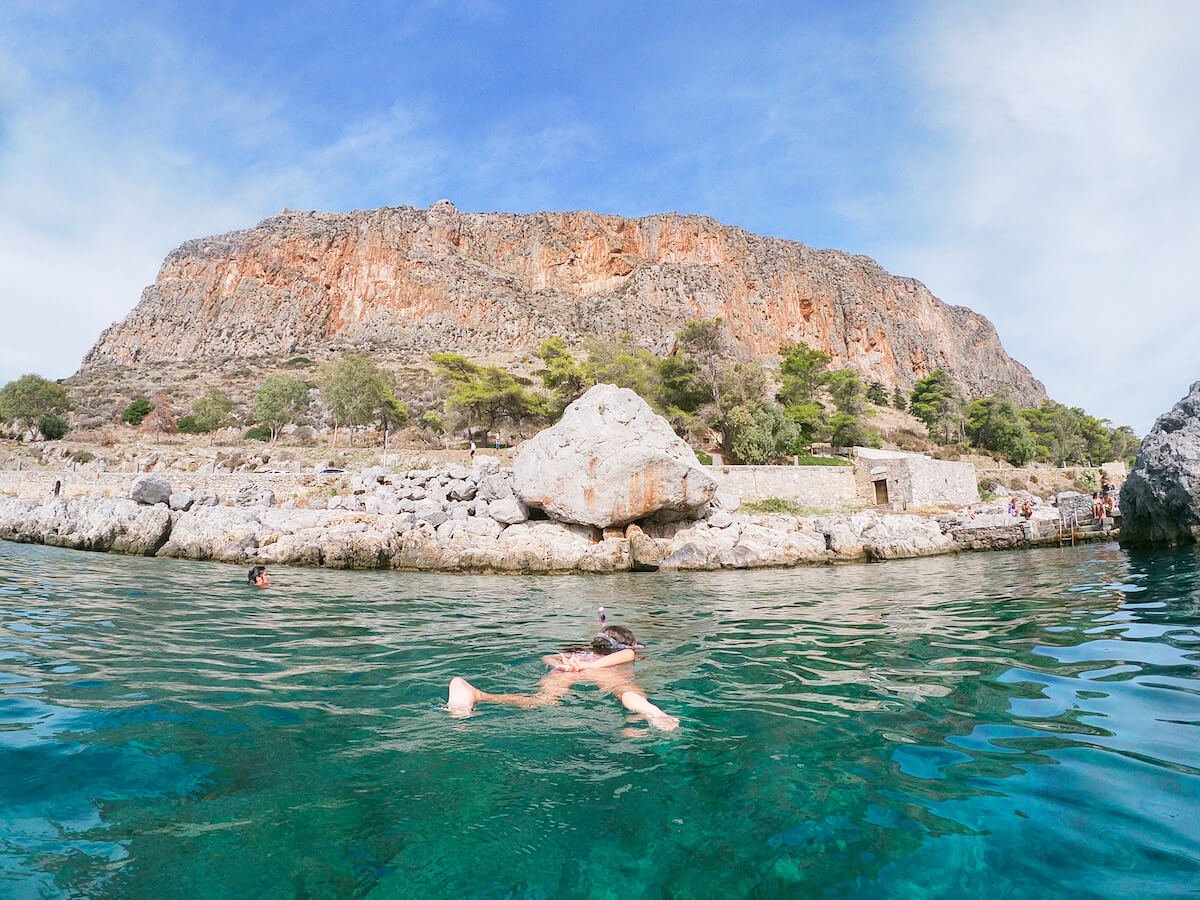 Child swims in Monemvasia Greece