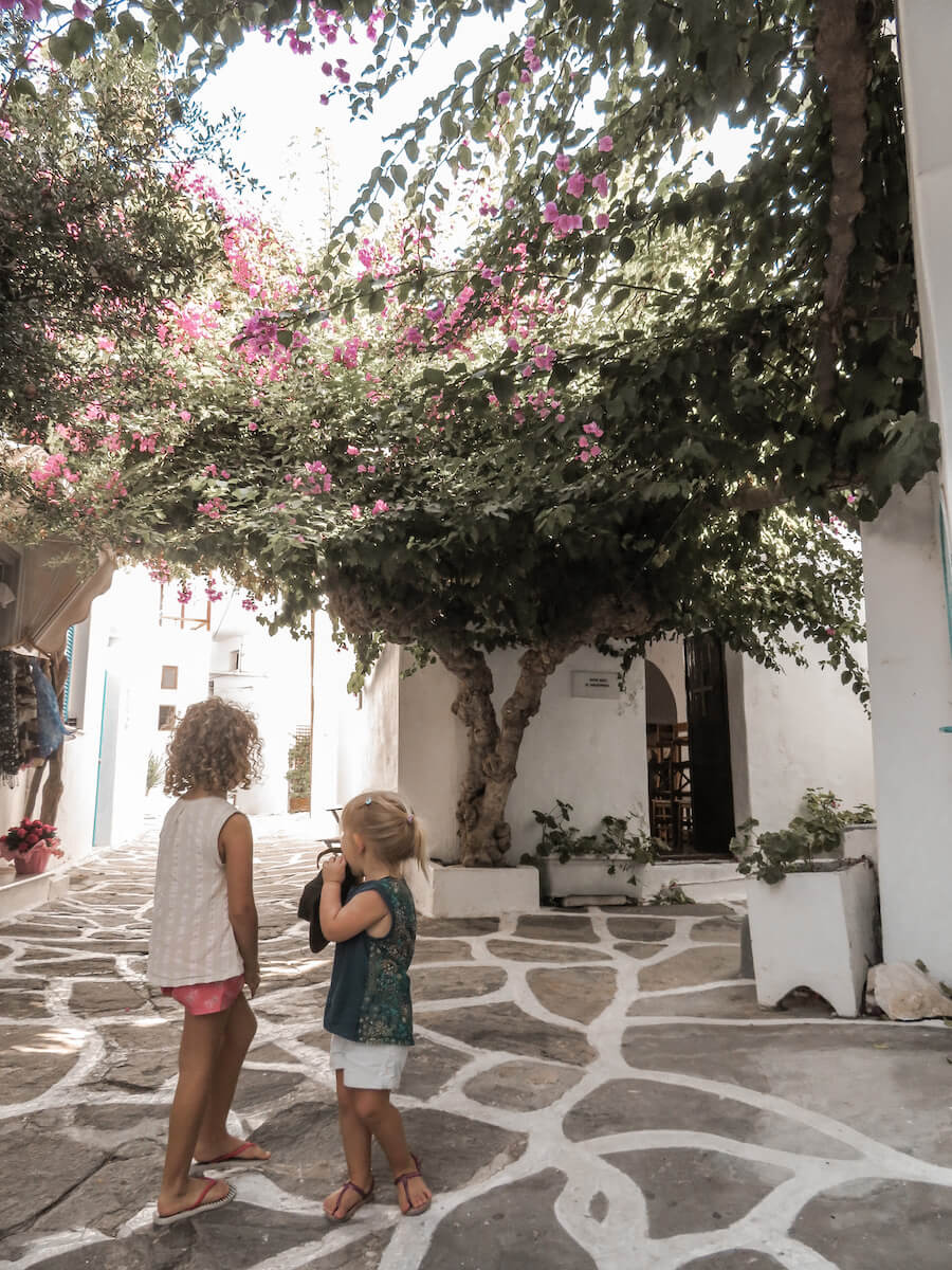 Kids walking the street in Mykonos
