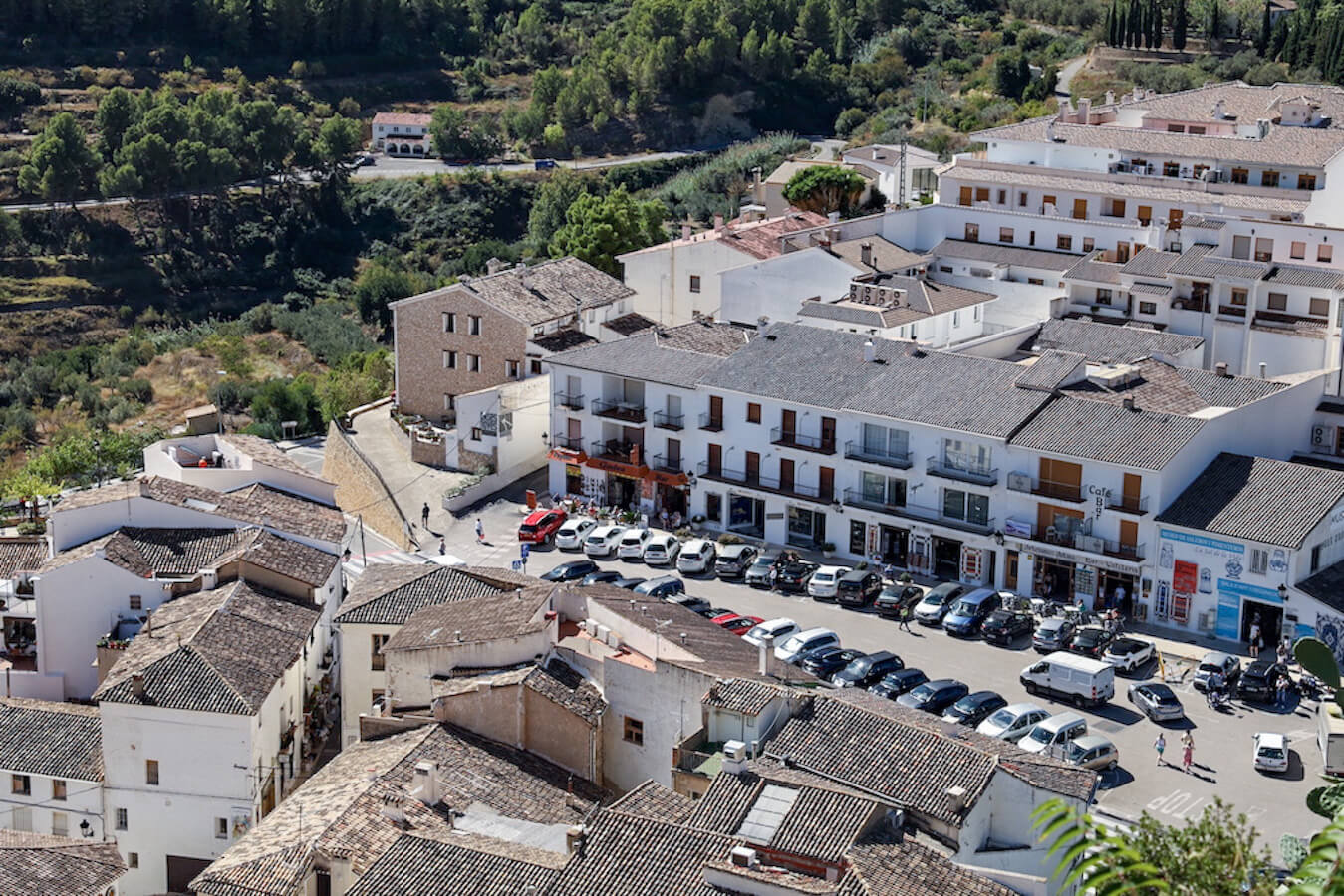 The carpark as see from the ruins and walled city of Guadalest Castle.