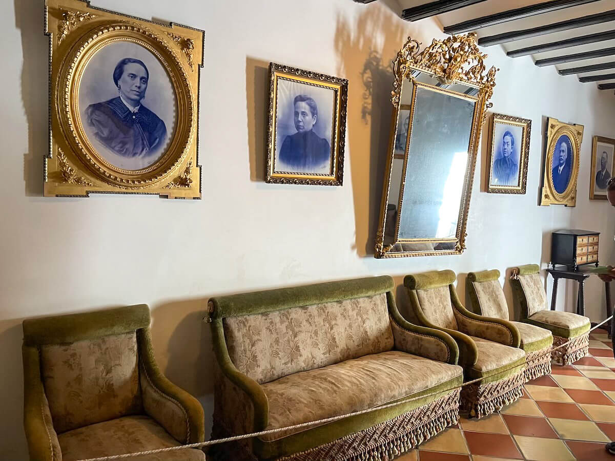 Inside the Casa Orduña Museum, historical family photographs and living room display