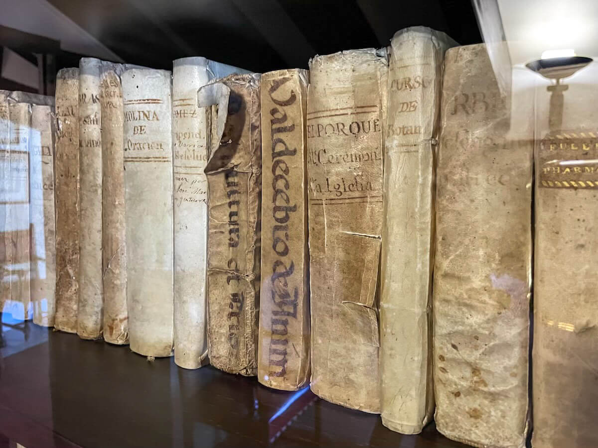 Inside the Casa Orduña Museum, historical books on display in the library.