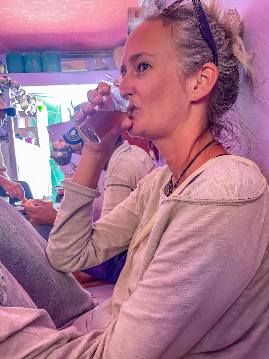 A woman drinks mint tea in Morocco