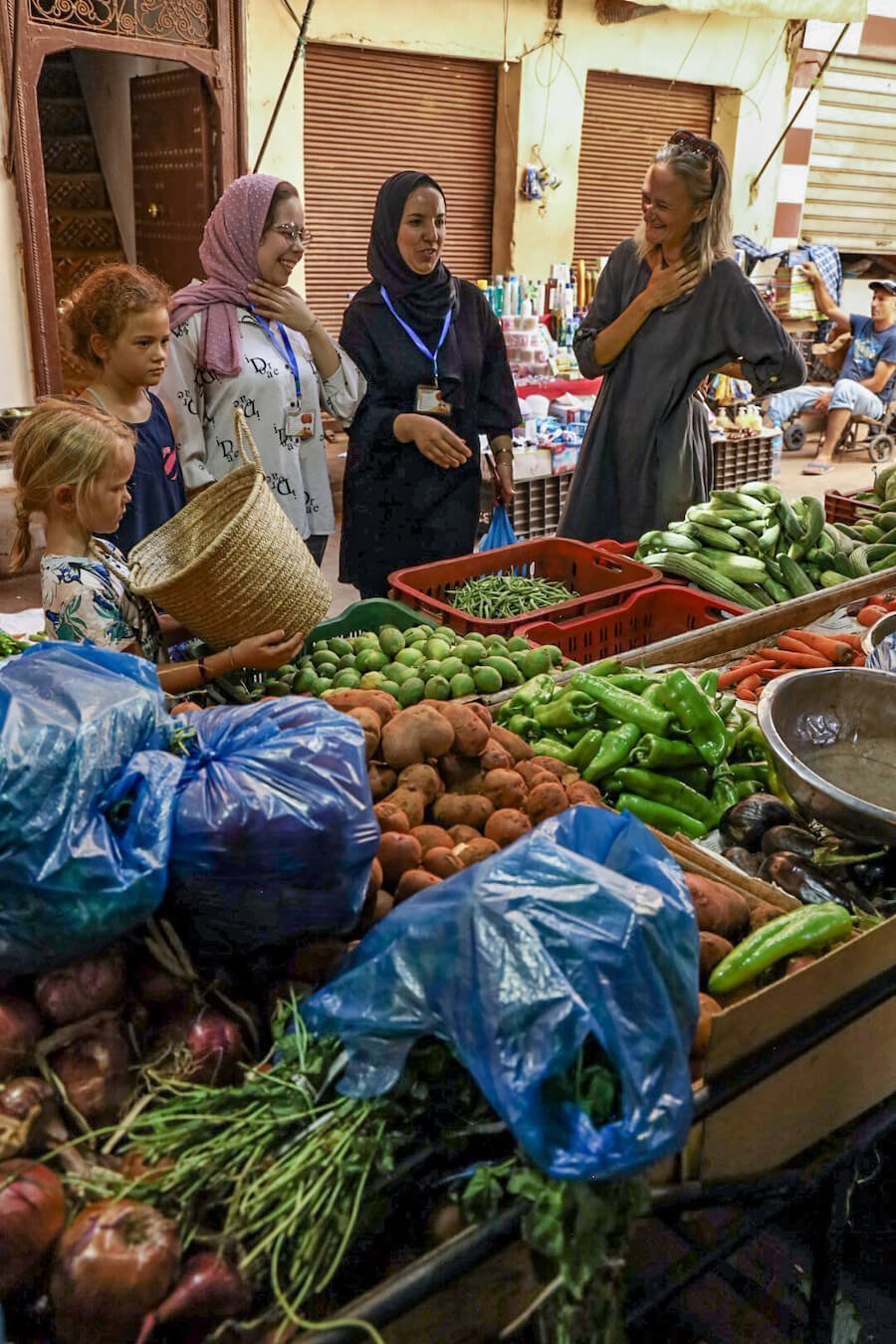 A cooking lesson in fes starts at the vegetable market in the middle of the medina.