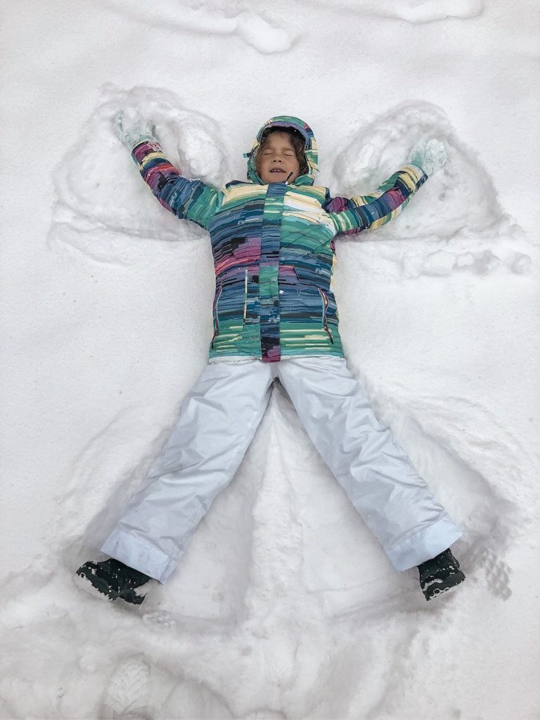 Info about snow conditions and skiing in Gudauri in December - snow angel in fresh powder