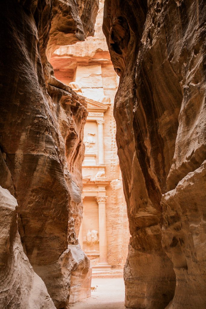 Peeking through the Siq towards the Treasury in Petra - Jordan itinerary