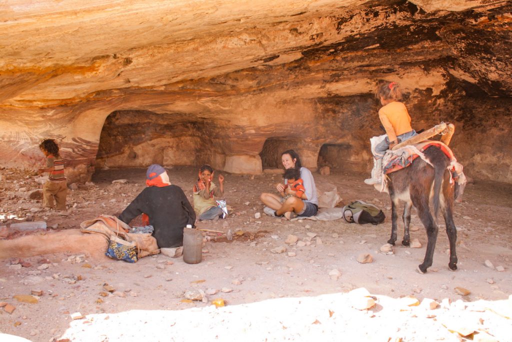 Cup of tea with locals in a cave in Petra - Jordan itinerary