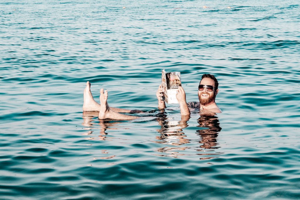 Floating on the dead sea in Jordan - leave to the end of the itinerary to soak weary feet