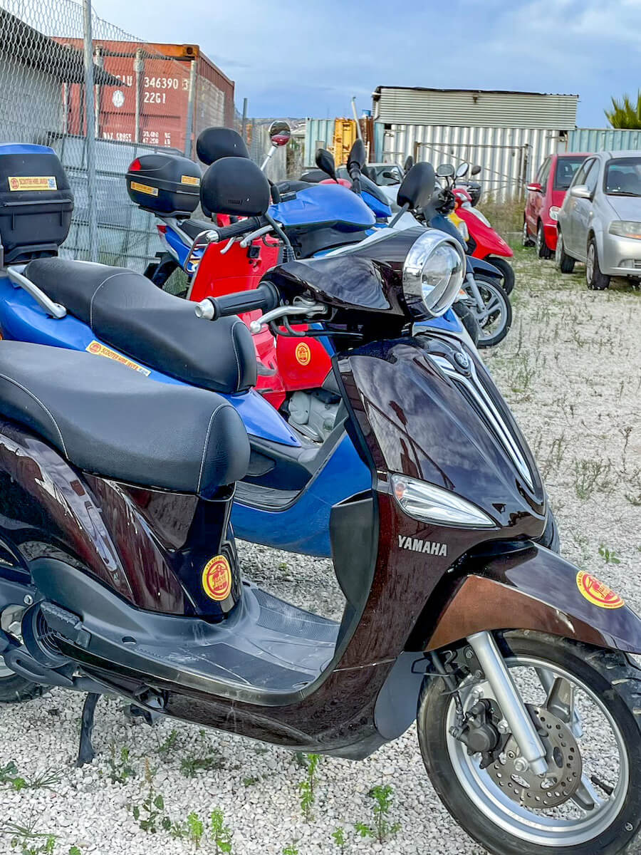 Scooters in Javea wait for rental, a popular way for holiday makers to get around town.
