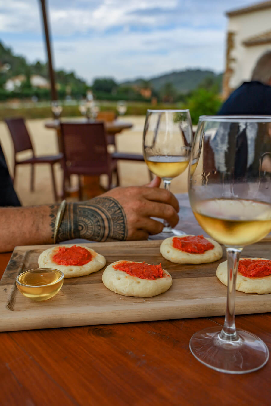 Tapas and a glass of moscatel wine in Javea (Xabia), Spain.