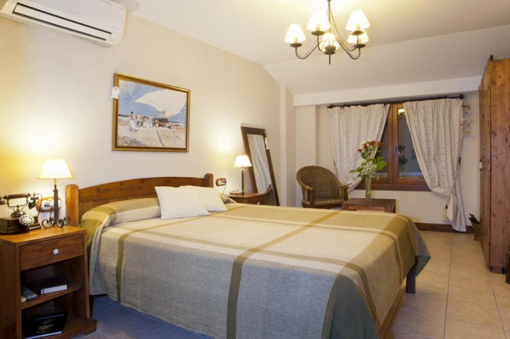The retro design of a double room accommodation option at Triskel Hotel in Xabia Historic Centre - Javea, Spain
