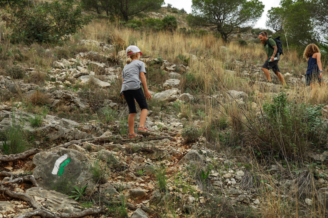 A family walk on the Santa Llucia Ermita SL CV-99 walking trail in Javea Spain.