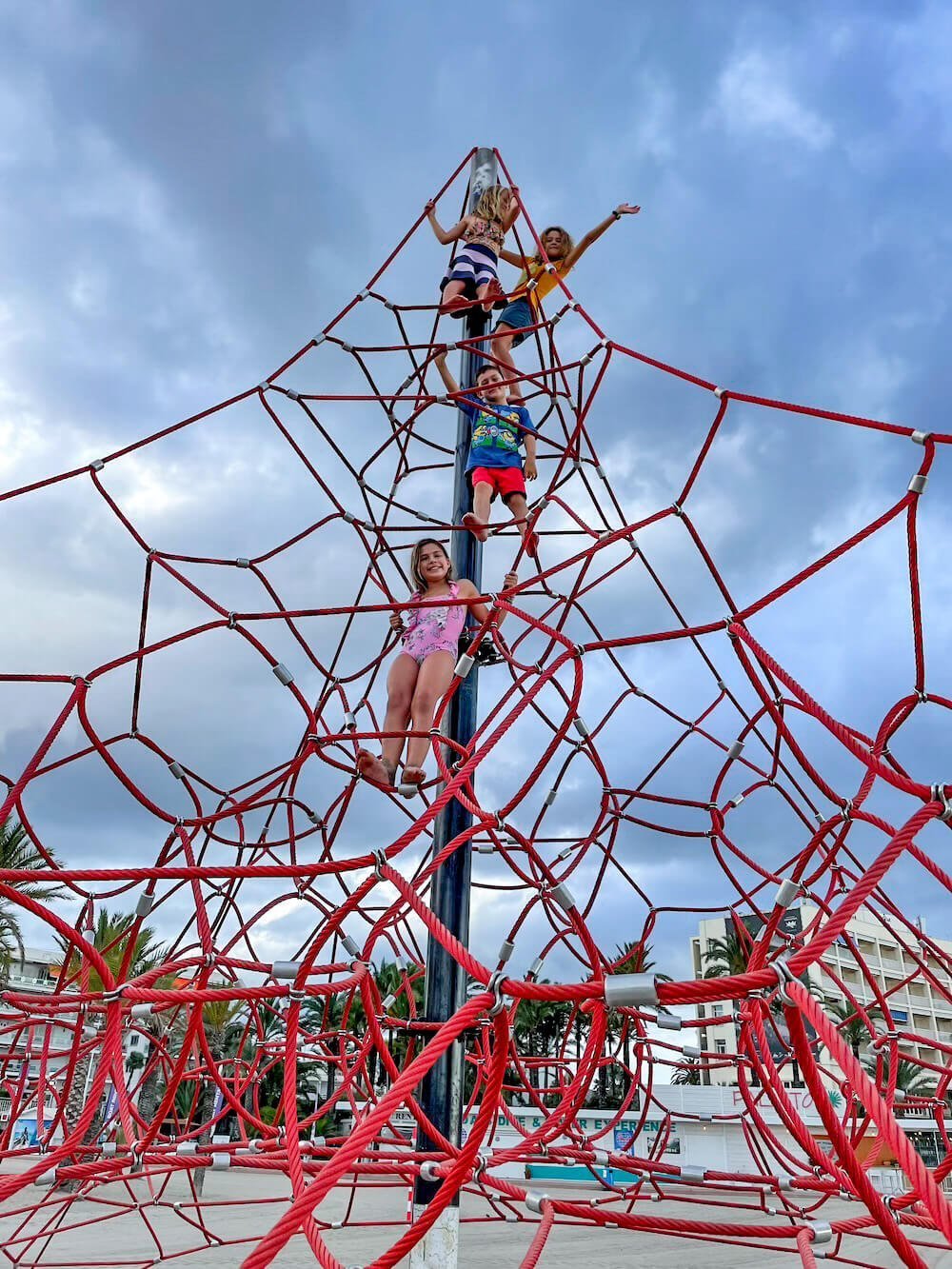 Kids climb at the Arenal Climbing Frame