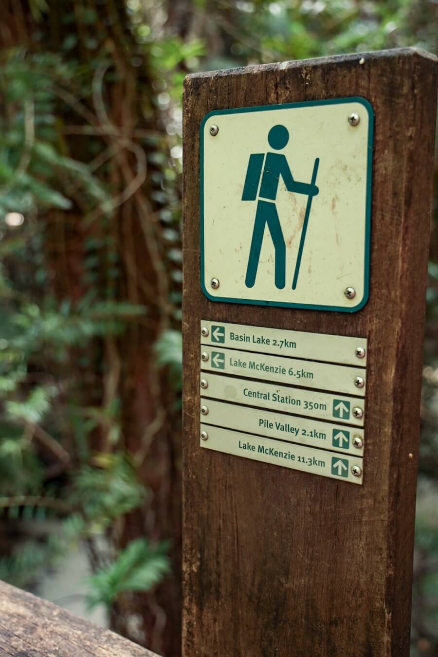 A sign marking trail distances of the K'gari Great Walk on Fraser Island