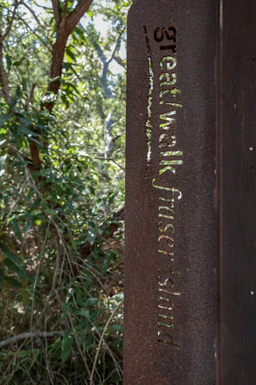 The K'gari Fraser Island Great Walk sign marking the trailhead at Dilli Village
