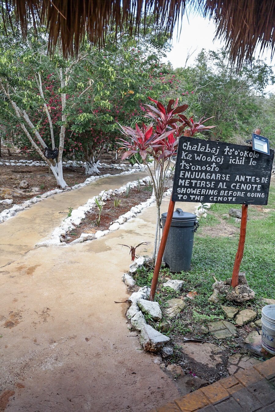 Signs reminding tourists to shower before swimming in the cenotes.
