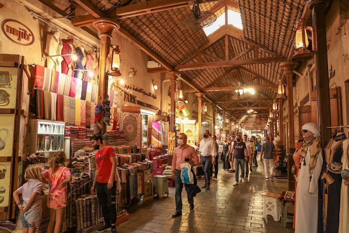 People shopping at the Dubai Creek souq market