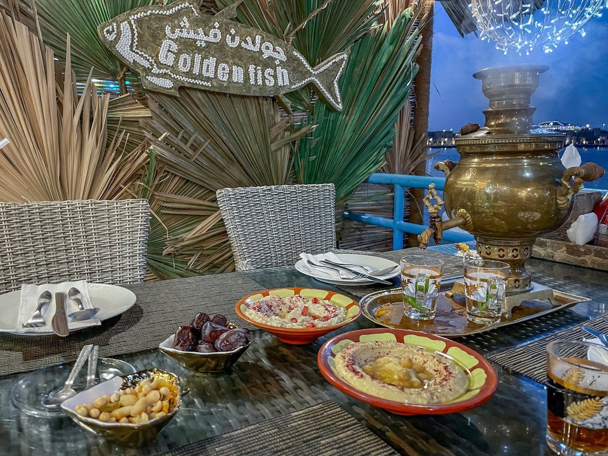 A meal and large authentic pot of tea at the Golden Fish overlooking the Dubai Creek