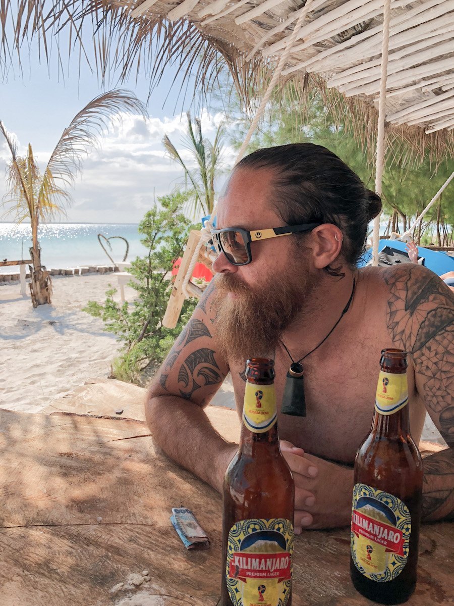 Sunset in Zanzibar, beach bar and a beer.