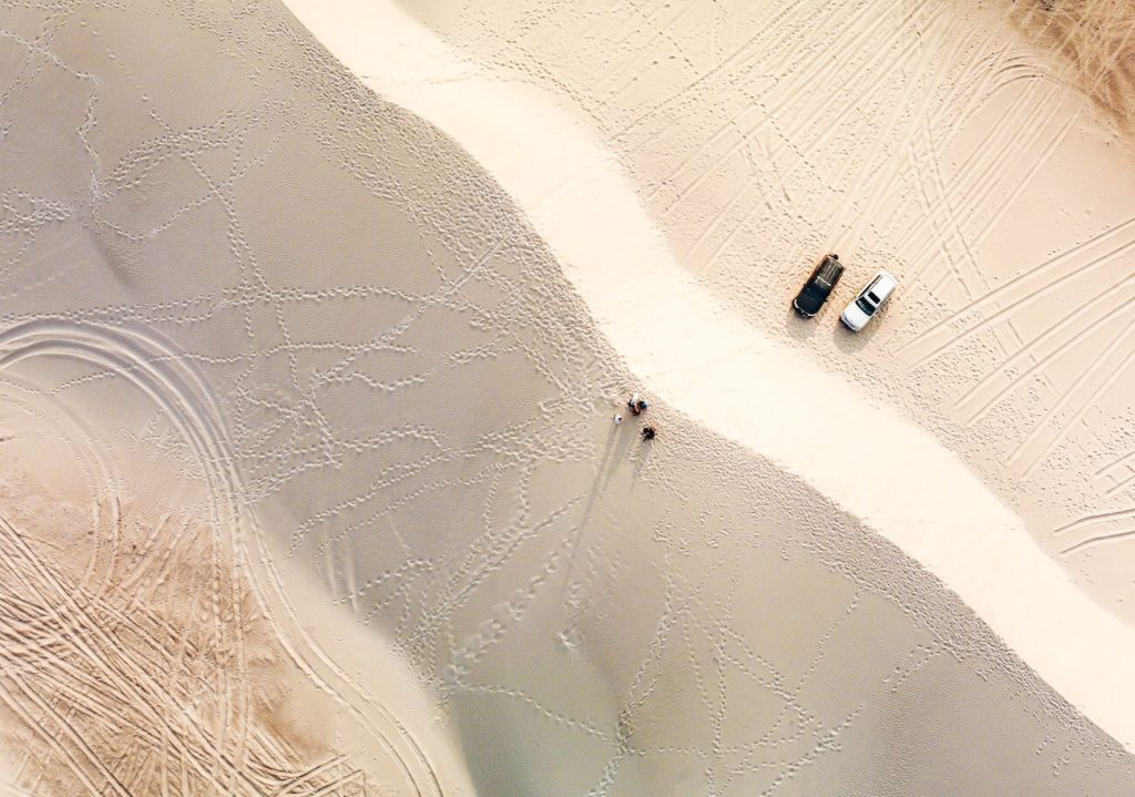 Tourists visit the sand dunes on a tour of Socotra