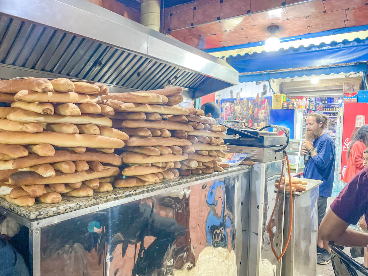 Baguettes are lined up in a street food stall in Essaouira