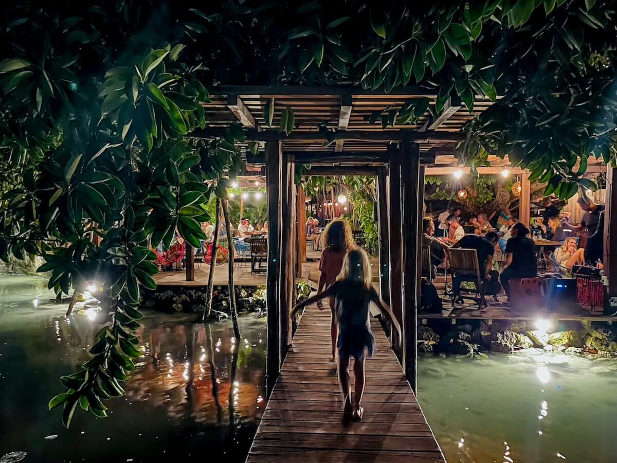Kids walk the pier at La Playita